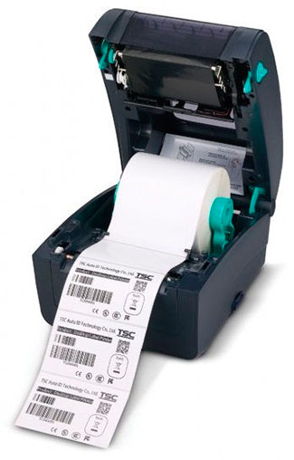 Impresora de código de barras abierta mostrando el rollo de etiquetas